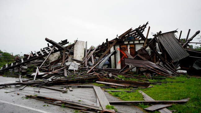 A storm damaged building is seen along Blackburn Lane, Thursday, May 9, 2024, in Columbia, Tenn. Severe storms tore through the central and southeast U.S., Wednesday, spawning damaging tornadoes, producing massive hail, and killing two people in Tennessee. (AP Photo/George Walker IV)