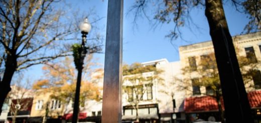A mini monolith stands in a raised flowerbed on Hay Street on Tuesday.  The 3-foot-tall sculpture first appeared Dec. 3, and nobody as yet has taken credit for placing it there.